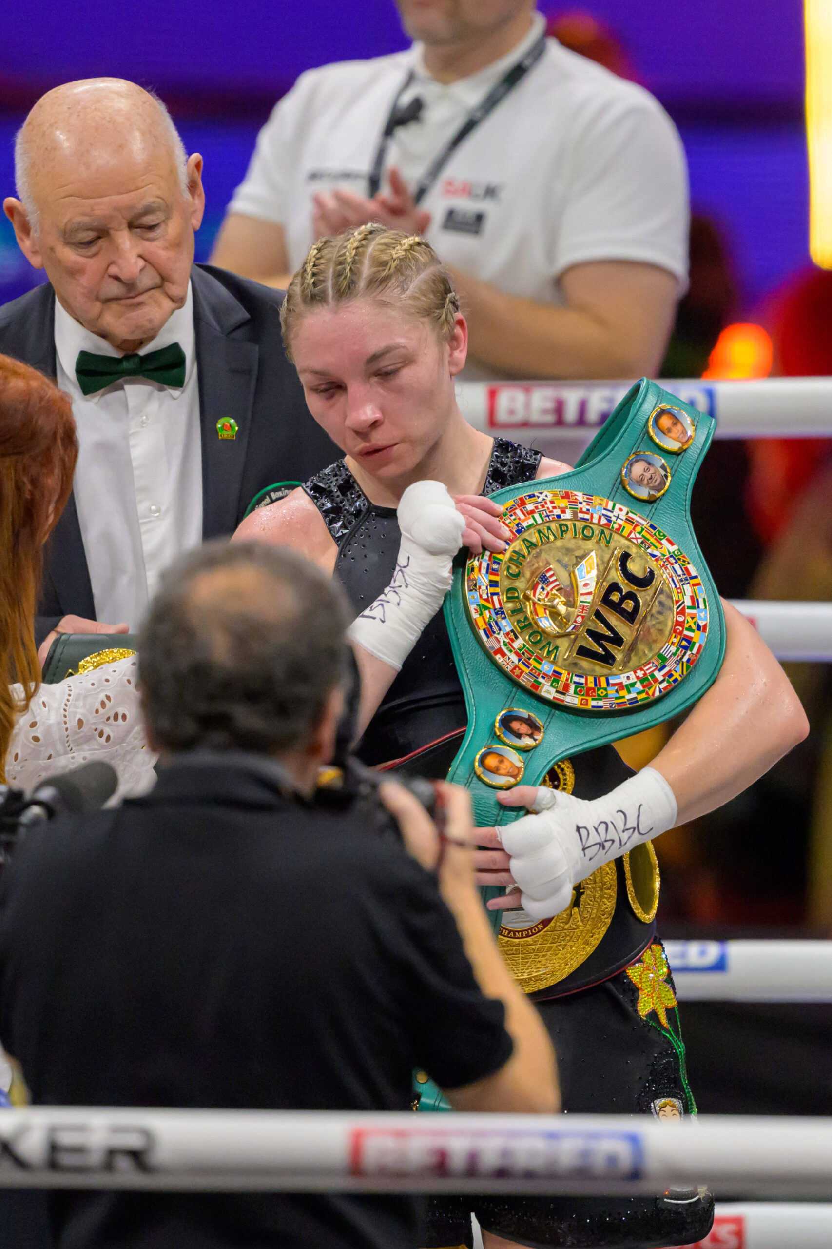Lauren Price holds the WBC welterweight belt after beating Natasha Jonas